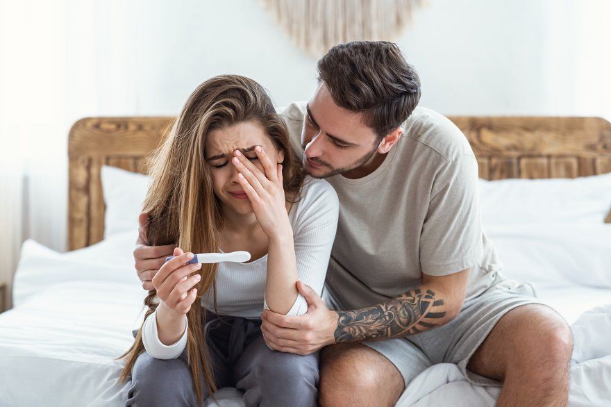 Couple distressed over negative pregnancy test - infertility support at Maan Hospital Bhopal