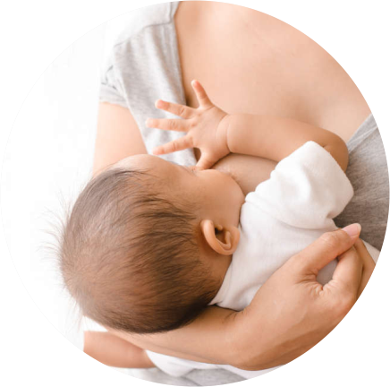 Mother breastfeeding newborn baby – nurturing lactation support and newborn care at test tube baby center in Bhopal.