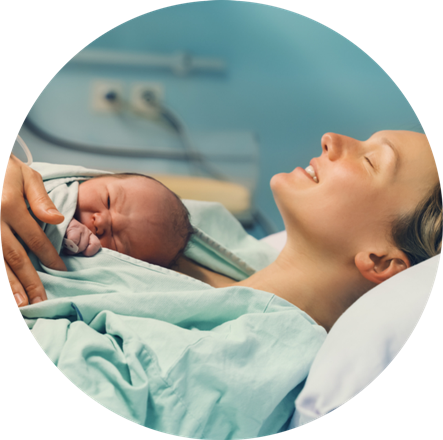 New mother holding newborn after safe delivery at Maan Hospital Bhopal"